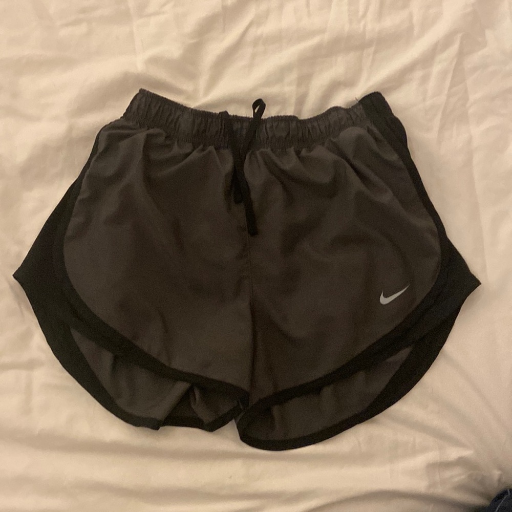Nike dri-fit running shorts. Gray with black trim. Women’s small. EUC